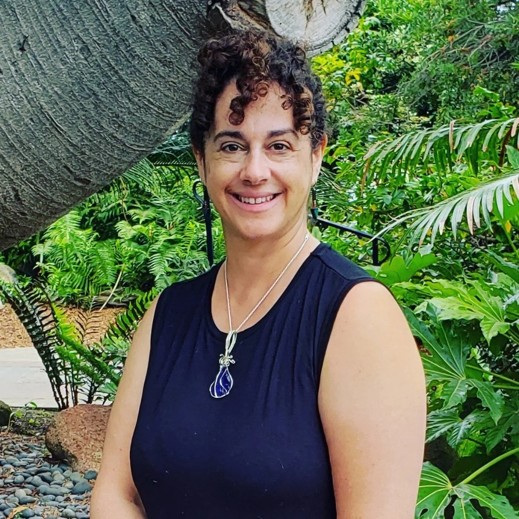 Portrait of Lily Kandaris smiling outdoors
